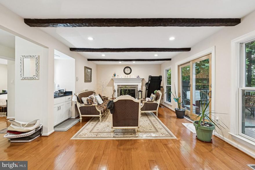 Elegant all-brick colonel single-family home that is nestled quietly on almost a half-acre lot, beautifully located within the desired community of Langley Oaks McLean. This home provides an extremely rare opportunity to enjoy nature at its finest while being within minutes of every amenity the city of McLean has to offer.  *MAIN FLOOR BEDROOM * HOME OFFICE* FULL FINISHED BASEMENT

This 6 BEDROOM, 4 FULL bathroom, 2-car-garage home provides over 4000 sqft of modern updated living at its finest, filled with ambient lighting throughout all three levels.  The Main floor boasts stunning hardwood flooring, an oversized gourmet kitchen accented with stainless steel appliances, double ovens, granite countertops, a huge island, and gorgeous cabinetry for ultimate storage space.  Main floor includes the convenience of having a spacious main floor bedroom with a large closet, a large family room with a gas fireplace, a spacious full bathroom, a den, and a refinished walk-out deck perfect for entertaining or to just enjoying the 15 additional acres of protected woodlands right behind you.   Second floor continues with the exquisite hardwood flooring, an oversized laundry room,  4 large additional bedrooms, a large bathroom with dual sinks, one of the bedrooms has been converted to a huge office (can be easily converted back), and an enormous primary with en-suite highlighted by dual sinks, a stand-up shower, and a beautiful soaking tub.  Primary also has 2 very large walk-in closets.  Fully finished Lower level offers a large entertainment area or recreational room, another spacious bedroom perfect for guests or multi-generational living, a full bathroom, and an additional area perfect for additional storage.
Don’t miss this exceptional opportunity to live in one of McLean’s most desirable neighborhoods!

Enjoy easy access to Georgetown Pike, George Washington Parkway, I-495, I-66, Dulles Toll Road, and the Silver Line Metro. Tysons Corner, with its upscale shopping, fine dining, and entertainment, is just minutes away. Washington, D.C. is a short 10-minute drive. Outdoor enthusiasts will love being close to a 150-acre wooded preserve with scenic hiking trails and the renowned Clemyjontri Park. Langley HS / Cooper MS / Churchill ES.  Upgrades that come with the home include 29 newly installed solar panels, an electric car charger in the garage, a refinished walk-out deck, and a finished basement with a full bathroom and bedroom. Additional improvements include robot lawn mowers, bidet toilets, a new roof (retiled in 2022), and sunlight-tinted windows for added energy efficiency and comfort.