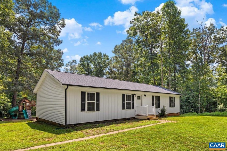 Wonderful 3 bedroom, 2 bath home nestled on a 5 acre parcel with a creek bordering the back of the property! All the major items have been completed, just settle in and make it your own! New roof, classy vertical siding, windows, gutters and deck completed in 2024. Addition was done in 2019, bringing it to a spacious 1,440 sqft, all freshly painted. The split bedroom design works beautifully for privacy and space. Large living room, upgraded stainless appliances, and a separate laundry/pantry area for convenience. There's a space for your RV as well. The 30amp hookup with water is out back, and a 50amp hookup located at the house. Carport, large shed and the perfect playset convey! No HOA, and the location is just minutes from I64 and the town of Louisa, making this one a must see!,Oak Cabinets