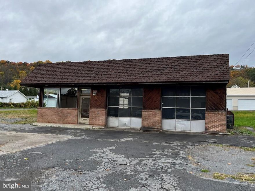 Corner double lot in a great location! Zoning is Commercial/Industrial.  This property includes 2 parcels.  The garage is situated on the one parcel and the second parcel is a vacant lot next to the garage. The property is currently tenant occupied and used as an automotive garage.  This property could be used for many different commercial purposes.  It would be a great location for an office, such as insurance, real estate, notary, or continue to be used as an automotive business.  The additional vacant lot next to the building offers many options including adding multi-unit residential housing.  Call the listing agent today to schedule a showing.