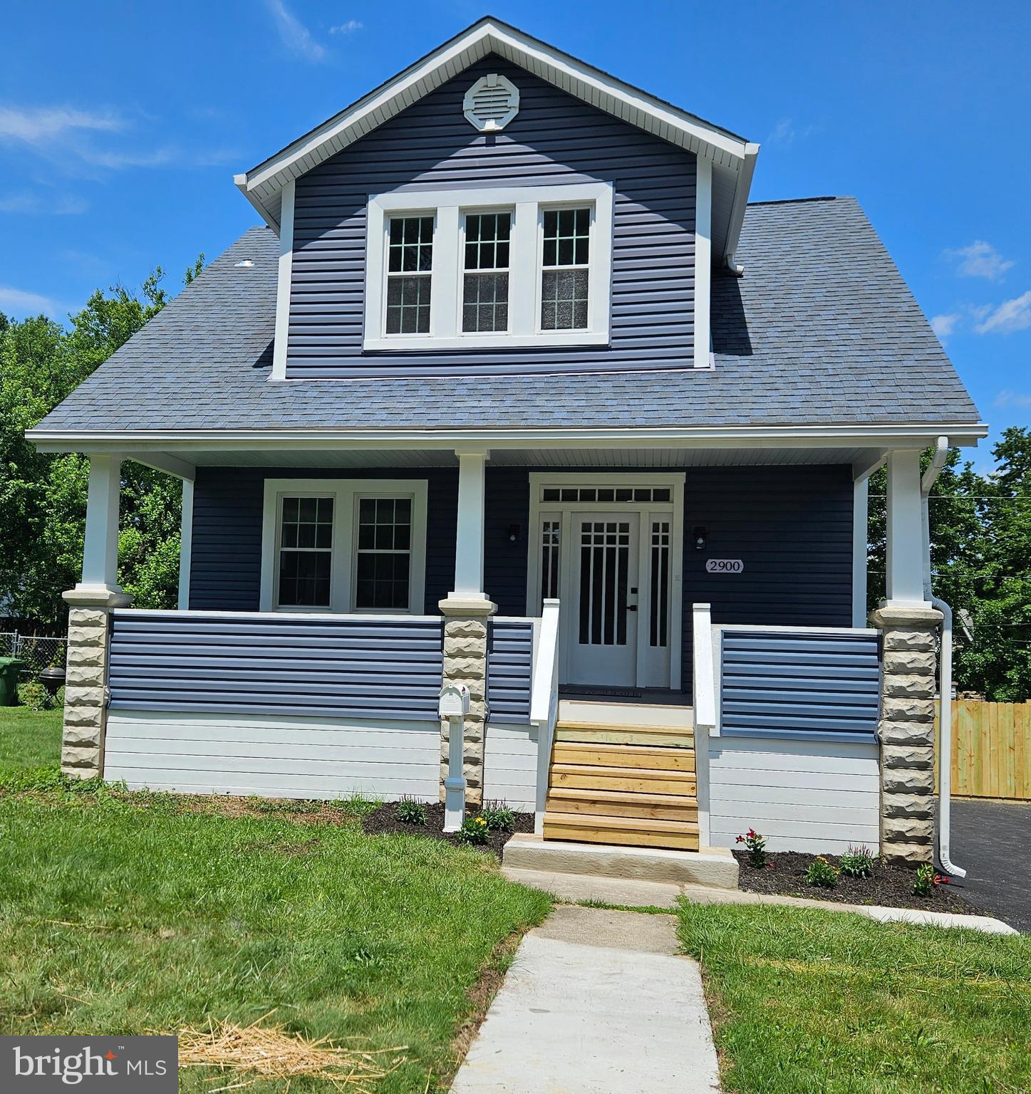 DON'T LOOK ANY FURTHER!!! "I have something amazing to show you," come lay your eyes on this beautifully renovated 2900 square foot detached home on a " tree-lined street." in the Hamilton neighborhood. featuring 4 bedrooms, 2 full baths, 1 half bath. The flow and wide lay-out between rooms, makes it easy to move around and enjoy the space of the open-concept living room, dining area and kitchen creating a sense of spaciousness and connection. All-natural lighting making it feel bright and airy and inviting. Recessed lighting throughout. Brand new A/C unit. Main level includes Cozy living room, spacious dining area with a chandelier above, walk into a gorgeous well equipped eat-in kitchen with seating around a beautiful white quartz island for entertaining and boasting with all stainless-steel appliances, 1 half bath, and large bonus room facing the rear to be use as a family TV room to enjoy watching movies or use for whatever your heart desires. Upstairs fully carpeted, 3 nice sized bedrooms, master bedroom walk-in-closet, 1 full bath. Easy on down to the lower level with 1 bedroom, 1 full bath with walk-in-shower, washer and dryer hook-up, open sitting area to relax, read a book or watch tv while waiting for clothes to finish washing and drying, 2nd bonus room in the rear of basement. It can be used for multi-purposes, such as an exercise room, large enough to put a treadmill, elliptical machine, exercise bike and free weights, man or woman cave or simply let your imagination run wild. Also, there is a cement storage area inside the bonus room that can be used to store items or make a small wine cellar. An exit door that leads to the back yard under the deck. After seeing the inside, now check out what the outside has to offer. Entertainment on front and rear. with a large front porch for relaxation, nice and cozy to sit out on early in the morning while having a cup of tea, coffee, lemonade or whatever you like to sip on to start your day, listening to the birds chirping. Large back deck for gathering and cooking on the grill. Cement area under the deck for picnic tables for cook-out food, eating crabs or just relax in some shade and yard space for more fun. As you can see this home has lots of space for family and friends to enjoy. This beautiful home gives a sense of warmth and tranquility making it a welcoming place to relax and spend time with loved ones.