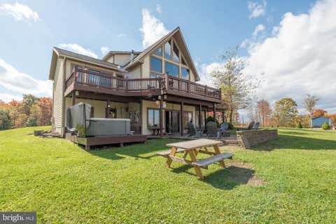 Photo of 395 Woodlands Hill Lane, OAKLAND, MD 21550 (MLS # MDGA2012628)