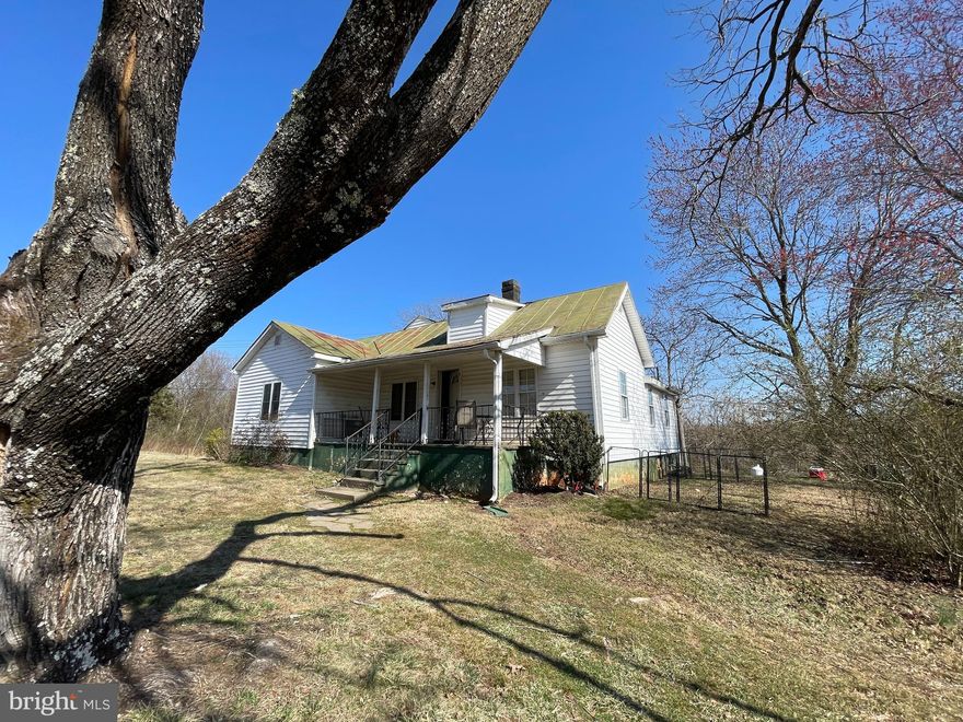 Great potential in this spacious 4 bedroom and 2 bath home on 13.9 acres, metal roof, rear deck, lower level unfinished walkout & laundry. Possible to subdivide for another lot to build another home. Just outside of Culpeper. Needs a total remodel. Home is occupied, appointment required. Home is being sold as-is.