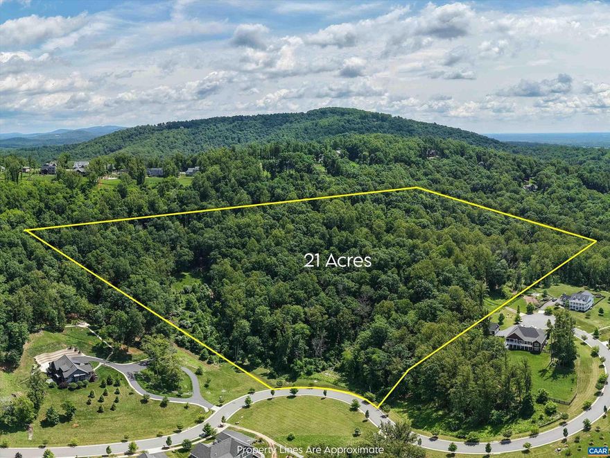 Stunning 21-acre mountaintop parcel in Hyland Ridge, Charlottesville VA. Tucked at the end of a quiet cul-de-sac, this expansive property offers unparalleled privacy and sweeping mountain vistas. Located close to Darden Towne Park, it provides direct access to scenic walking trails and outdoor recreation within a friendly neighborhood. Less than a mile from Pantops, the site blends rural serenity with close proximity to Charlottesville?s downtown, shopping, and dining. The land is approved for two dwellings, offering flexibility for a guest house or rental unit. The home you build will boast extraordinary mountain views, creating a picturesque backdrop for years to come. Additionally, the property features high-speed fiber optic internet, ensuring fast, reliable connectivity for remote work and streaming. Surrounded by mature trees and open space, this unique acreage invites you to create a private retreat in the heart of scenic Virginia.