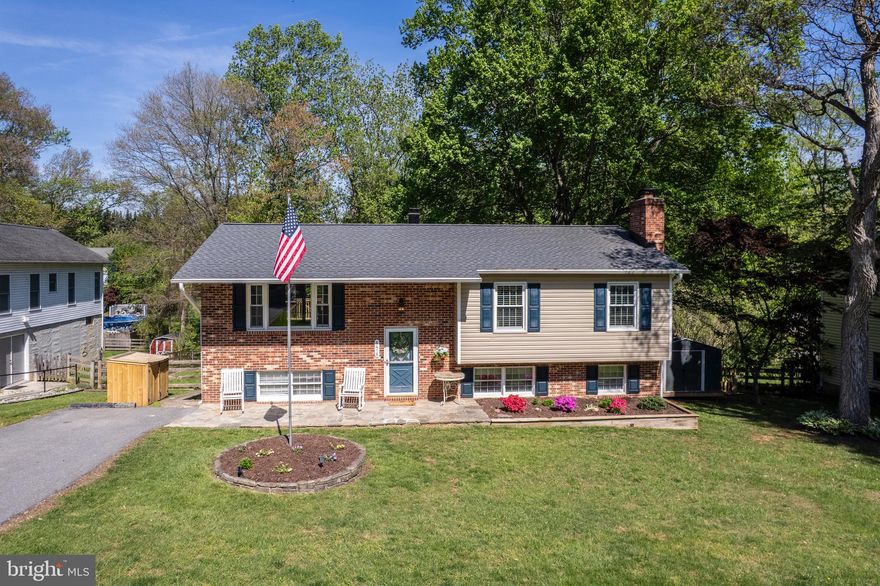 This recently updated 4-bedroom, 2 full and 1 half bathroom split foyer home is beautifully situated in a private cul-de-sac on 6418 Oak Hill Drive, Sykesville, MD. The open upper level boasts a spacious kitchen, dining, and living area featuring a huge island with seating, granite countertops, and a stylish tiled backsplash. Three bedrooms are located on the upper level, each with solid hardwood flooring, including a primary bedroom with a fully updated ensuite bathroom. Step outside onto the deck, which includes stairs leading down to the fenced backyard-perfect for outdoor entertaining and relaxing in privacy. The lower level offers a large recreation room, a cozy woodstove, a convenient half bath, and a fourth bedroom finished with luxury vinyl plank flooring. Recent updates include a new roof and fresh paint in 2025, siding, upper-level windows, and gutters replaced in 2022, a new water heater in 2023, and an HVAC system installed in 2024 with oil backup, ensuring modern comfort and efficiency. This home combines thoughtful updates with a serene, private setting, making it an exceptional place to call home. Don’t miss your chance to see it-schedule a private tour today!