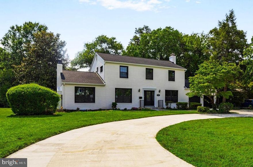 You’ll love this stately all-brick Colonial, renovated from top to bottom, offering over 4,000 square feet of finished living space on a flat 20,000 sq ft lot—a rare combination of classic charm and modern updates with plenty of room to spread out.

The versatile floor plan features multiple living areas to accommodate your lifestyle, including a formal living room, spacious updated eat-in kitchen, a large family room with fireplace, a second living area or den (ideal for an office, playroom, or media room), a powder room, and a separate laundry room. The home boasts three fireplaces adding warmth and character throughout.

Upstairs, you’ll find four generous bedrooms, including a primary suite with a walk-in closet and two full baths. The finished lower level provides a large rec room and ample storage, offering even more flexible space.

Enjoy the deep, level backyard with a stone patio, perfect for outdoor entertaining, relaxing, or even adding a pool, garden, or sport court. The oversized two-car garage and circular driveway provide convenience and plenty of parking.

Extensively updated with a new roof, new windows, new flooring, and so much more—this home is truly move-in ready.

Located with easy access to I-395 and I-495, and close to parks, shopping, dining, and popular destinations like Old Town, Shirlington, and DC.