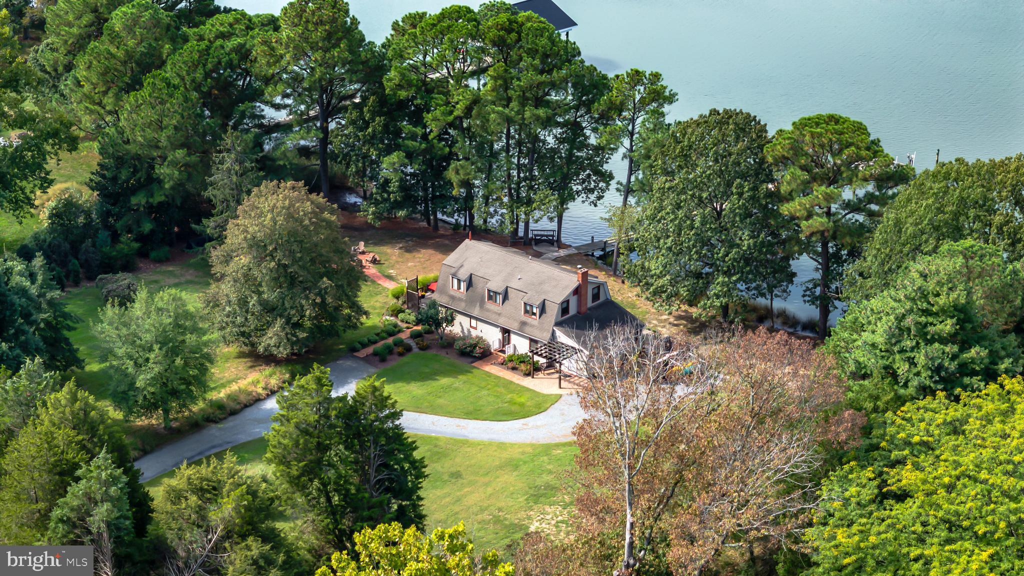 Incredible Waterfront Property Near St. Michaels - A Must-See Gem!
Welcome to your dream waterfront oasis, nestled on the sought after Cooper Point Road, just seven minutes from the heart of charming St. Michaels. This remarkable property boasts a prime location on the deep, tranquil waters of Caulk Cove, offering breathtaking sunset views that will leave you speechless.
Featuring three bedrooms and 2-and-a-half bathrooms, this meticulously maintained home, offers an open floor plan, with additional den, mudroom and utility room. in the past it had been used lightly as a vacation rental. It has been designed to showcase its stunning waterfront setting. Enjoy water views from nearly every room, making the serene landscape a part of your everyday life.
Secluded on over 2 acres of private land, this property provides the ultimate retreat for those seeking relaxation or adventure. Whether you're gathered around the fire pit, fishing off the shore, boating or sailing on the sparkling waters, this is the perfect escape for making unforgettable memories.
With ample space for entertaining and room to add a pool, this expansive property offers endless possibilities. Boating enthusiasts will appreciate the mean low water depth of over 5 feet, although buyers are encouraged to verify water depth. Plus, public sewer has already been allocated—making future expansion a breeze!
Don’t miss out on this rare opportunity to own a piece of waterfront paradise at an incredible price. Experience the best of coastal living right here on Cooper Point Road, where every day feels like a vacation.