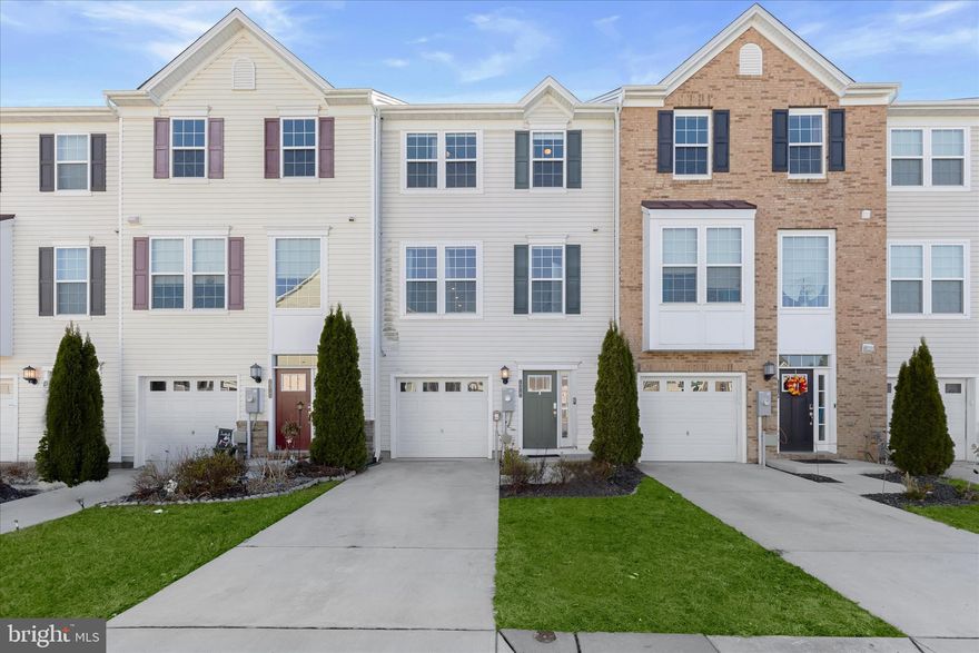 Your like-new 3-bedroom, 2 full and 2 half bath garage townhome awaits in an idyllic courtyard setting in sought-after Beechtree Estates. The entry level welcomes you with a modern neutral color palette and luxury vinyl plank flooring that sets the tone for the home. This level leads to a walk-out bonus room offering excellent flexibility as a home office, recreation room, or guest space. Soft, plush carpeting adds warmth and comfort. A powder room and direct access to the garage complete this level.
The main living level offers a bright, open floor plan designed for everyday living and entertaining. The sunny living room flows seamlessly into the gourmet-inspired kitchen with stainless steel appliances, a gas range, a large center island ideal for casual dining and conversation, and a spacious pantry. The dining area provides additional room for gatherings and easy flow between spaces. Just beyond, the newer composite deck is perfect for al fresco dining or relaxing outdoors. A powder room completes this level.
Upstairs, the tranquil sleeping quarters include the primary bedroom suite with a vaulted ceiling, walk-in closets, plush carpeting, and a private en suite bath. Two additional bedrooms with vaulted ceilings, ceiling fans, and carpeting share a full hall bath. A conveniently located laundry area completes this level.
 Additional highlights include owned solar panels and a newly installed smart doorbell with remote access and camera capability with no subscription required. Residents also enjoy access to the community clubhouse with event space, a fully equipped gym, and an outdoor pool. Conveniently located near shopping, dining, and I-95, this home offers a comfortable blend of style, luxury, and everyday convenience.