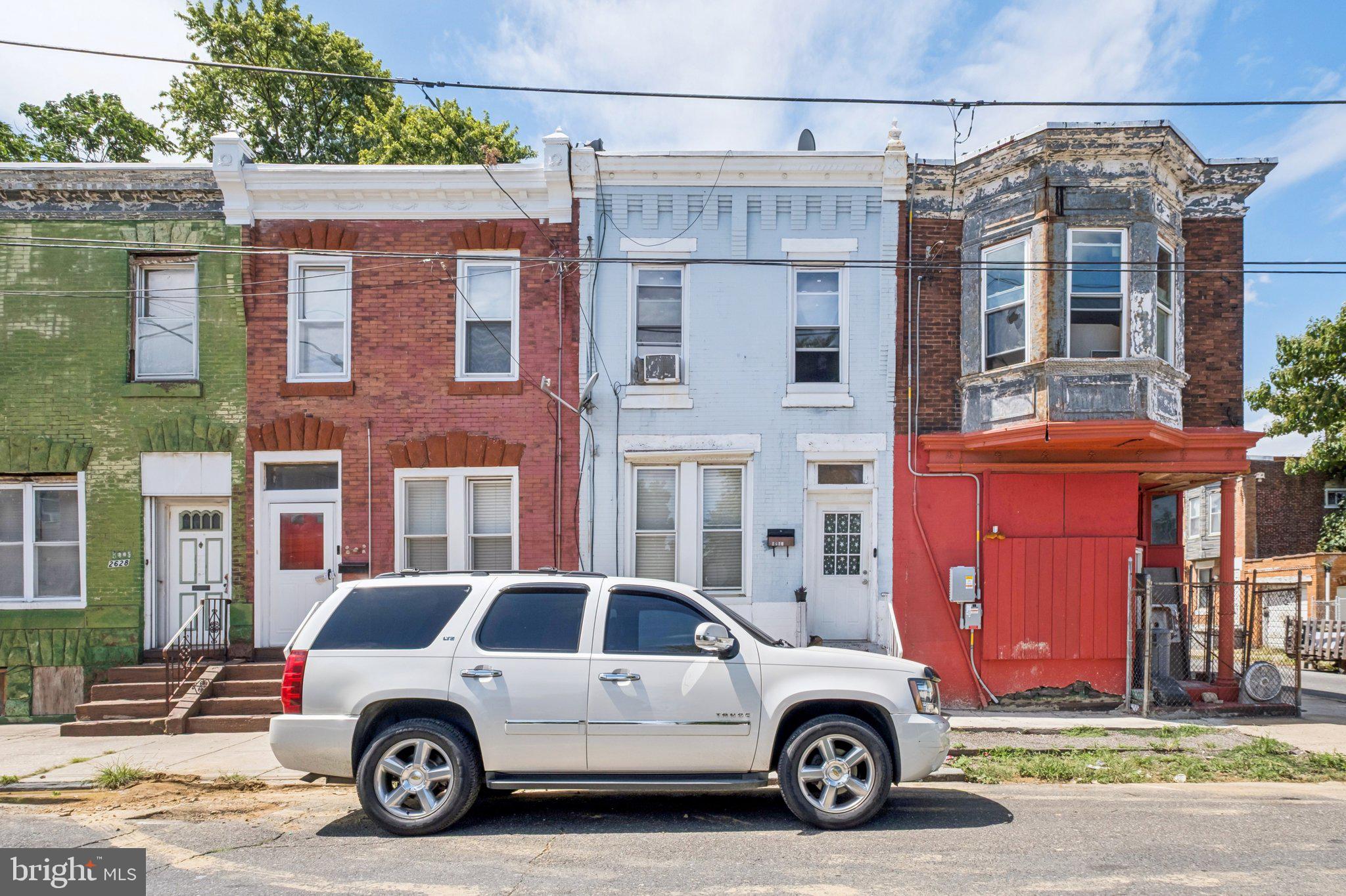 Buyer Incentive! This property qualifies for a special lending program offering a $5,000 credit at settlement. Prime opportunity in the rapidly growing Strawberry Mansion neighborhood! Whether you’re searching for a turnkey investment or your next home, this property delivers. Currently rented at $1,500/month ($18,000 annual gross income) on a month-to-month lease, it offers strong cash flow with flexibility for investors or owner-occupants. Inside you’ll find a spacious, recently renovated living room that flows into a formal dining area, a kitchen with modern appliances, ample cabinetry, and room for a table, plus a bonus rear room with a half bath and laundry hookups. The fenced concrete patio is perfect for summer cookouts or relaxing outdoors. Upstairs are three well-proportioned bedrooms and an updated full bath with tile finishes and a tub/shower combo. A large full basement provides storage, a second laundry hookup, and excellent potential for finishing into additional living space. With easy access to public transit, major highways, and Center City, this home is a standout value in one of Philadelphia’s fastest-growing neighborhoods—schedule your showing today!