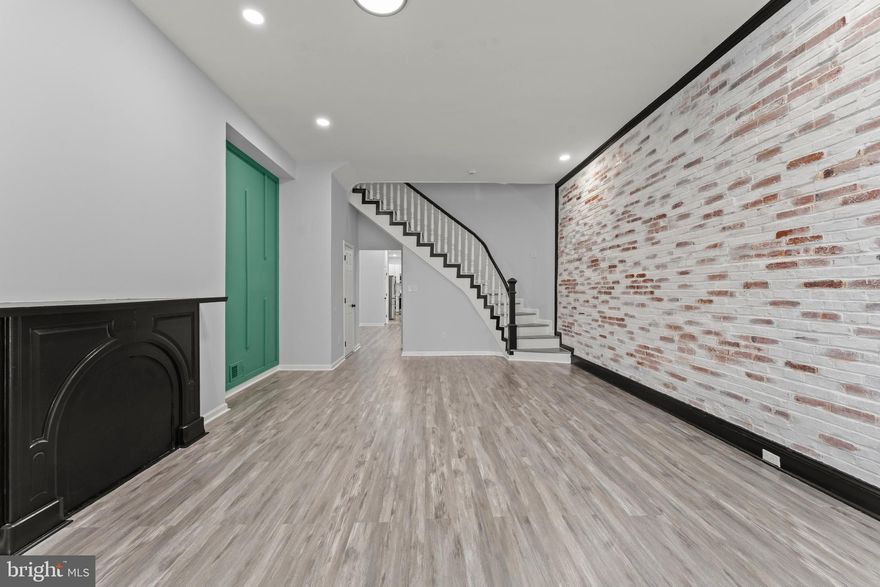 Welcome to 917 Edmondson Ave — a beautifully refreshed Baltimore rowhome offering modern comfort, classic charm, and spacious living in a convenient city location.

Step inside to find a bright, open main level with stylish brickwall,  accent fire place and flooring  withupdated finishes, and plenty of room to relax or entertain. The kitchen features contemporary cabinetry, generous counter space, and a layout ideal for both cooking and gathering.

Upstairs, you’ll find well-sized bedrooms filled with natural light, along with updated bathrooms designed for everyday comfort. A full unfinished basement  provides additional flexibility — perfect for storage, a workshop, or future expansion.

Outside, enjoy a private rear yard that’s great for outdoor dining, pets, or gardening. The home is located on a classic Baltimore block with easy access to commuter routes, public transportation, downtown amenities, local parks, and neighborhood shops.

This home is perfect for anyone seeking an affordable home with room to grow, 917 Edmondson Ave delivers exceptional value and convenience.

Schedule your tour today and see everything this charming city home has to offer.