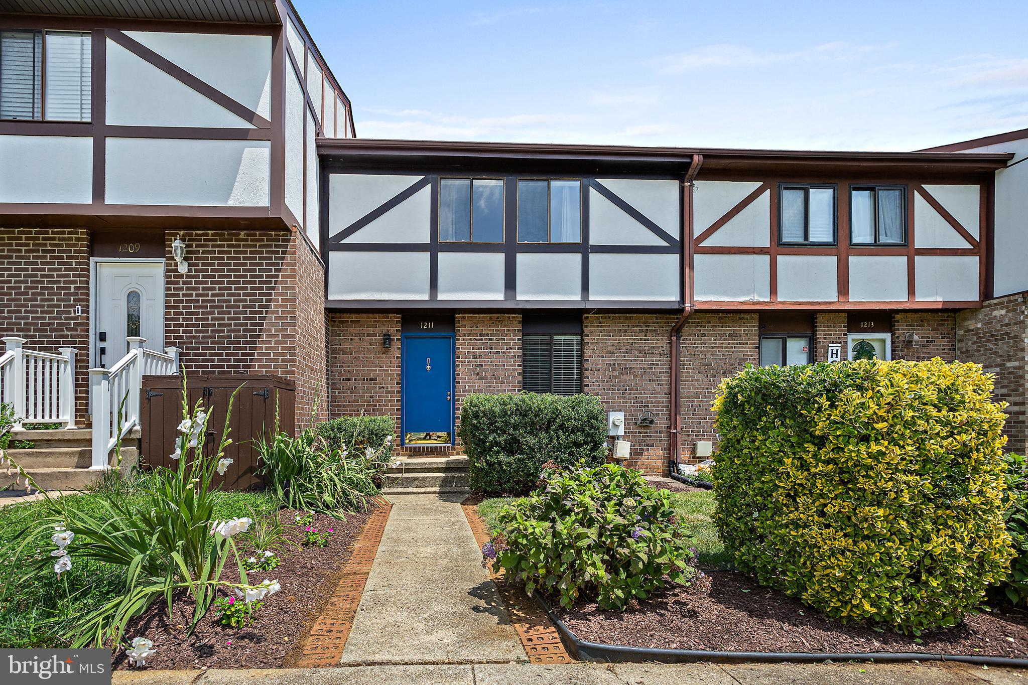 Lots of space for the price range in this well maintained townhome. Main level features an updated kitchen with premium cabinetry and granite counters, half bath, separate dining room and sunken living room with wood burning fireplace. Upper level has three spacious bedrooms and two updated baths. In the lower level enjoy the storage space in the utility room and large family room with built-in shelving, and new sliding glass door walking out to your fenced rear yard. New refrigerator, stove, and w/d. Shows well.