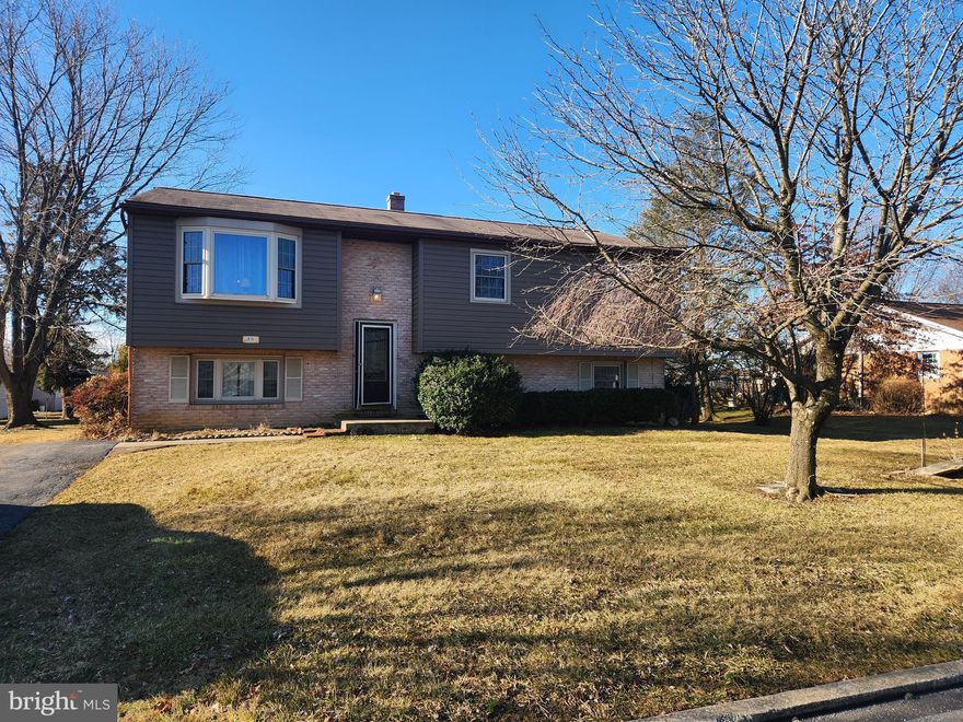 This property will be offered at Public Auction on Monday, April 14, 2025 @ 6pm.  The listing price is the opening bid only and in no way reflects the final sale price.  10% down due at auction, 2% transfer tax to be paid by the purchaser, real estate taxes prorated. This home is situated on a quiet street in a nice neighborhood and offers convenient access to Route 422 and downtown Lebanon. The upper floor of the split-level home features a cozy living room, a kitchen with access to the covered deck, a dining room, a master bedroom with an attached full bathroom as well as two additional bedrooms and a full bathroom. The lower level hosts a spacious family room with a wood stove and access to the patio as well as a powder room and an unfinished area consisting of a laundry space, workshop, and storage. Additional amenities include a storage shed and covered deck & patio, great for entertaining friends and family! While this home is in need of cosmetic updating, it offers great potential!