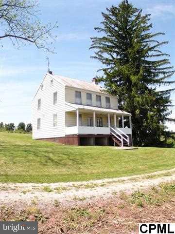 Beautiful even sloping farmland w/ 2 story original farmhouse. Clean and Green Program. One half bath only. No heating system. Hand Dug well. Sand Mound. Basement is wet/nasty. Basement is earth floor.