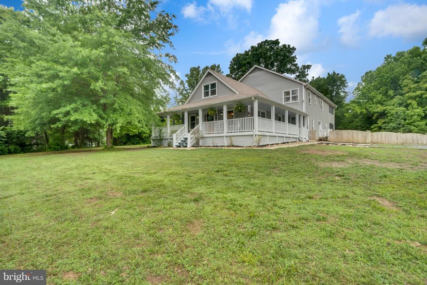 Charm and Character surround this spacious 3,800+ sqft  home situated on 5+ acres! Cozy wrap around front porch, rear screened in porch with patio. Gourmet Kitchen with open floor plan to the family room. Gas Stove, with center island and granite countertops. Hardwood floors through out main level. Master Suite with luxury bath and screened in veranda overlooking lush wooded back yard.  No HOA