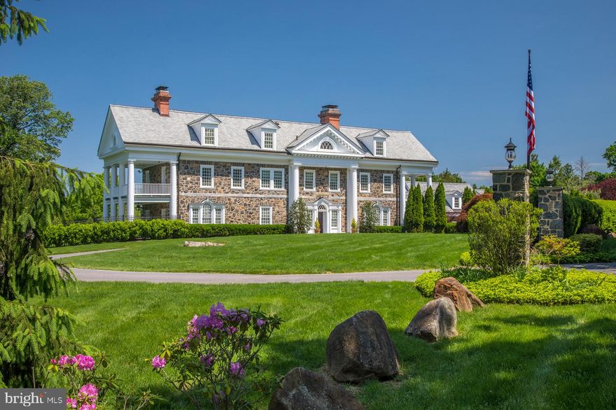 In-person showings available! One-on-one in-person showings are now allowed. Please contact the listing agent to schedule. Virtual tours are also available.  Live the family life you ve dreamed in this turn-of-the-century Colonial masterpiece nestled on 3.5 pristine acres in desirable Devon. The 5 bed, 5.3 bath estate blends old-world charm with modern-day amenities boasting a heated pool and spa, outdoor kitchen, guest cottage, and lushly landscaped grounds in an idyllic Chester County address. Two stately pillar entrances welcome you home to an expansive drive, culminating into a palatial stone residence with 4-car attached garage enveloped in nature. Warm and inviting, a story of sophisticated interior design unfolds. A gracious foyer with fireplace and sweeping stairwell is flanked by separate formal rooms, both neatly tucked behind double French doors. The living area was built to entertain with a wet bar and access to an outdoor patio. The elegance and allure continues, with tall ceilings, gorgeous hardwoods, and classic moldings that harken to a level of craftsmanship that is rarely seen today. In the gourmet kitchen, custom cabinets, a Wolf gas stove, 3 sinks, 2 LG refrigerators, espresso maker, and a walk-in pantry with built-ins and extra fridge make cooking a breeze. Add to this a massive center island and sunny breakfast banquet for sipping morning coffee with a view. Nearby, a vaulted family room opens to a spacious patio and commercial-grade outdoor kitchen with pizza maker, ice-maker, dishwasher, stove, wine fridges, and refrigerator drawers. Fire up the grill, relax poolside, or head indoors to the walk-up basement to enjoy the custom home theatre, family room, and wine cellar with tasting area. On the 2nd floor, your master suite awaits with a gas fireplace, private terrace, and huge walk-in closet. A spa-quality bath adorned in rich designer tiles affords a double sink vanity, freestanding ceramic tub, and stall shower. Other highlights include an oversized utility room, multiple family rooms, several home offices, craft room, main floor laundry, and private walkway to the garage and mudroom. The versatile home gym with a full bath is great for an au-pair or in-law suite! Plus, the fantastic 1 bed, 1 bath guest cottage sits right off a heated hardscape path near the basketball court and is equally finished with a stainless steel kitchen and generous living. Few historic homes compare! Ideally situated in one of the most sought-after neighborhoods in town, just minutes from restaurants, shops, and exemplary Devon schools! Make your home in an estate for the ages. Its next chapter is up to you.