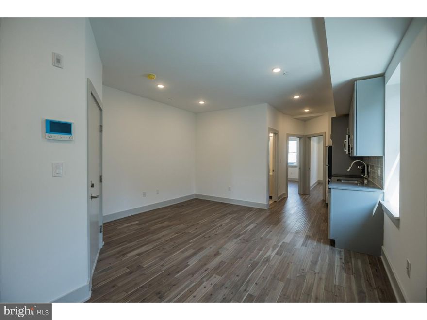 Be the first to live in this amazing bi-level three bedroom, two bath unit close to everything! Walk to museums, Penn, Drexel, transportation, restaurants, and more!  Each bathroom is luxurious with beautiful tiles, glass showers and nice finishes.  There is quartz and stainless in the kitchen with high end appliances.  The AC is high efficiency.  Great Space! Tour now.