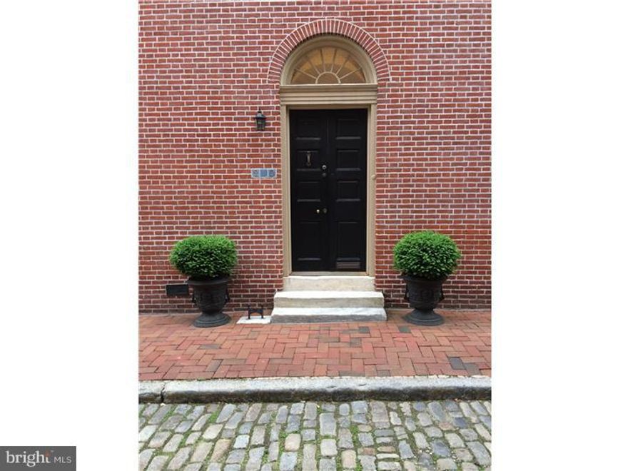 Circa 1830! Georgian Style. Built by Stephen Girard.  The Current Owner is Only the 3rd Owner of this Lovely Home. This Wonderful Period Perfect Corner Home is in Pristine Condition and has a Lovely English Tea Garden with a Fountain and a Parking Space attached to the Property. It is Located on the Corner of a Picturesque Cobblestone Society Hill's Philip St.  It has 3,100 Square Feet, 12 Foot Ceilings, Many, Many Details & Character Throughout, Perfect Original Floors, Beautiful Random Restored Wood Floors, All Plaster Walls, Original Hardware,  Pocket Window Shutters, 5 Fireplaces (3 of which have King of Prussia Marble Mantelpieces).  The Living Room is Gracious with a Fireplace next to the Formal Dining Room with Fireplace and Large Window overlooking the Lovely Garden.  The Romantic Kitchen located in the Lower Level boast Custom Designed Cabinetry, Granite Countertops, High End Appliances, Exposed Beams, Original Brick Flooring, Wood Burning Stove, Powder Room and a Large Window Overlooking the Garden Area ? This Area also has a Butler's pantry, Laundry, Mechanicals and Storage Space. The Second Floor is the Entire Main Suite ? Extra Large Front Room with Fireplace and a Wonderful Full Spa Bath, Double Vanity + a Separate Sitting/Dressing Room with a Wall of Cedar Closets and a Window Overlooking the Lovely Neighboring Roof Tops and Gardens. The Next Level has Two Bedrooms and a New Tile Bath. The Fourth Level has Terrific Flexible Space ? Den/Family/Media/Office Room, 14 Foot Ceilings, Wood Floors, Some Exposed brick, Many Custom Built Ins and Even a Sleeping Loft. Additional Amenities to Mention Last but not Least ? The Beautiful Graceful Period Staircase and Hall Gallery Space.This Dream Home is Located in an Incredible Neighborhood ? Wonderful Neighbors ? Close to Everything ? 3 Ritz Theaters ? Hundreds of Restaurants  - Coffee Shops ? Farmers Market ? Whole Foods ? Public Transportation ? Parks ? Gardens ? The Bell.