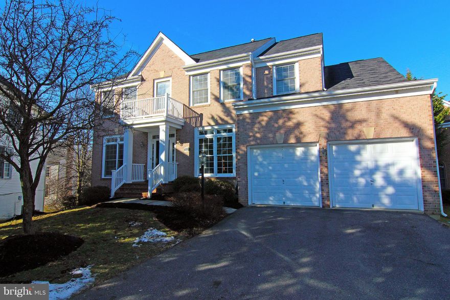 Elegant brick frnt near Town of Vienna & Tysons Corner. Nearly   acre lot w/ fenced back. Bright & open flr plan. Approx 4700 SF fin space. 5/6 br, 4.5 ba, HW in foyer & sep DR, kit w/breakfast rm, new granite, new SS appl & W/I pantry. Gas FP in fam rm. Lux MBR w/lg W/I closet, & fin walkout LL w/ rec rm, craft area, full ba, 5th bdrm, office/6th bdrm & storage. Near Silver Metro St, I495, Rt66.