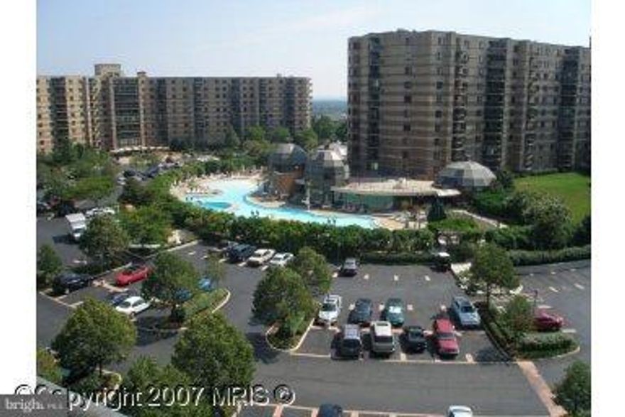 J Model at The Rotonda. Enclosed  large balcony. Wood floors in living + dining rooms and entry. Freshly painted. Bright and clean. All Rotonda amenities pool indoor + outdoor, bowling alley, party rooms, store, car wash areas and more. I garage space. ready for occupancy. Moving fee is $600 plus a $250 refundable deposit.