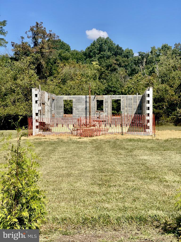 Imagine your own custom build! This 5-acre lot backing to trees is located in the sought-after county ranked as one of the “Best Places to Live in Maryland”. This extraordinary property zoned R200 allows subdivision into half-acre lots, making it an ideal canvas for investors or individuals looking to construct their dream home.
The existing structure has been stripped down, leaving a foundation to build from. The possibilities for rejuvenating this space are boundless. Verification needed on well, septic and building potential.
Within one mile of the MARC station, 10 minutes from the interstate, and 5-10 minutes from Clarksburg Outlets, a plethora of shopping centers, parks, and various entertainment options, this is a dream location. Don't miss out on this fantastic opportunity to snag a sought-after location for your next home.
