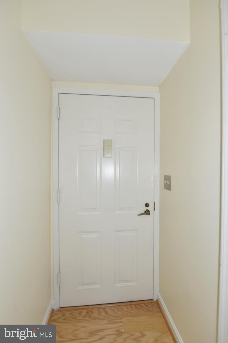 Perfect luxury 2 BR/2BA condo w/NEW wood floors. BR is freshly painted & carpet to be replaced. Enjoy granite kitchen counters w/pass through to DR/LR. Ceramic Tiled enclosed balcony not included in 930 sqft. MBR closet built-ins. Quiet view of Courthouse park. 1 garage & storage convey. Blocks to Metro, shops, restaurants & movies. Enjoy the pool, 2 gyms, putt green, tennis, 24-hr security, etc.