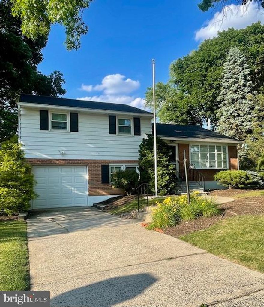 Beautifully renovated 4 bedroom, 2 bath home located in Salisbury Township sits perfectly on a corner lot.  There are so many things to love about this home!  Home has flawless hardwood floors that run throughout the main living area which includes living room, dining room and 3 bedrooms.  The home is accentuated by an open floor plan on the main level and great natural light due to a wonderful bow window in the living room. The kitchen features stainless appliances and a fantastic area for a breakfast nook.  Specific upgrades include new roof, central air unit, water heater, exterior hose bib, exterior spotlights, and 2nd laundry hookup in garage.  2nd full bathroom offers brand new luxury soaking tub with lovely tile surround.  Carpeted 4th bedroom has been added on the lower level, and could also be used as a gym or office space.  Basement has been partially finished, adding extra living space, yet preserving lots of storage space.  Basement includes the main laundry hookup and kitchenette, which is plumbed for dishwasher and sink.  Beyond the addition of more living space, this home is located in a lovely quiet neighborhood yet conveniently located near major highways, shopping and dining.  Make your appointment today!