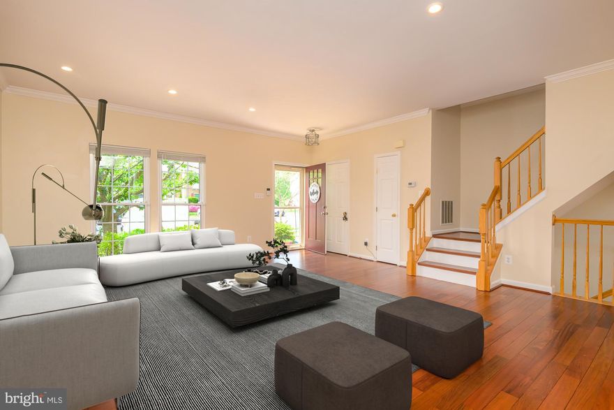 Welcome to this stunning 3-level brick townhome nestled in the sought-after Compton Village community. Boasting an open and airy floor plan, this home is filled with modern upgrades and timeless elegance. Enjoy the warmth of Brazilian cherry wood floors that flow throughout the main and upper levels, complemented by stylish recessed lighting in the main floor. The lower level boasts durable and stylish LVP flooring, ideal for everyday living. It also includes a gas fireplace and built-in cabinet for added storage and a spacious laundry area for convenience.

The large kitchen includes granite countertops, newer appliances, and ample space for cooking and entertaining. A formal dining room adds a touch of sophistication, perfect for hosting dinners or family gatherings.  Step outside to a private double deck backing to serene trees—ideal for relaxing or entertaining with a peaceful backdrop.

Retreat to the spacious main suite with soaring cathedral ceilings and a beautifully updated en-suite bathroom, complete with a modern shower. 

Enjoy all the amenities Compton Village has to offer, including tot lots, tennis courts, and a community pool. This home truly combines comfort, style, and a fantastic location—don’t miss it!