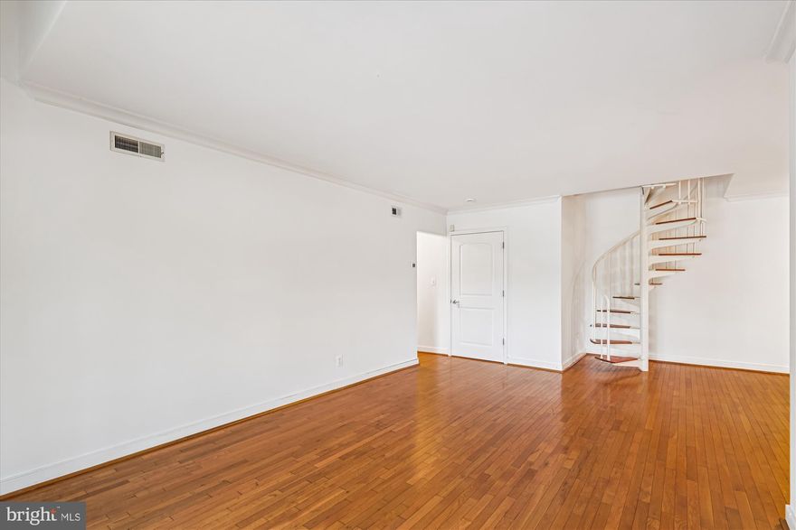 Welcome home to this spacious two bedroom two full bath condo with a loft. Stainless appliances in the kitchen, the stove is brand new, fine cabinets and granite countertops. Hardwood flooring in the living room and dining room, and a nice balcony though the living room slider. The primary bedroom has a large walk-in closet and attached full bath. And, the second bedroom is across the hall from the second full bath. Go up the spiral staircase to a huge family room area. The bathrooms were renovated in 2024 and the washer and dryer were replaced in 2024 as well. There are two (dual) HVAC systems, one for the lower level (replaced in 2022) and one for the loft (replaced 2019).  The community has a great outdoor pool for summertime, and across Hilltop Dr is plenty of recreational opportunity at The Pip Moyer Rec Center and Truxton Park. Great price for a great location!