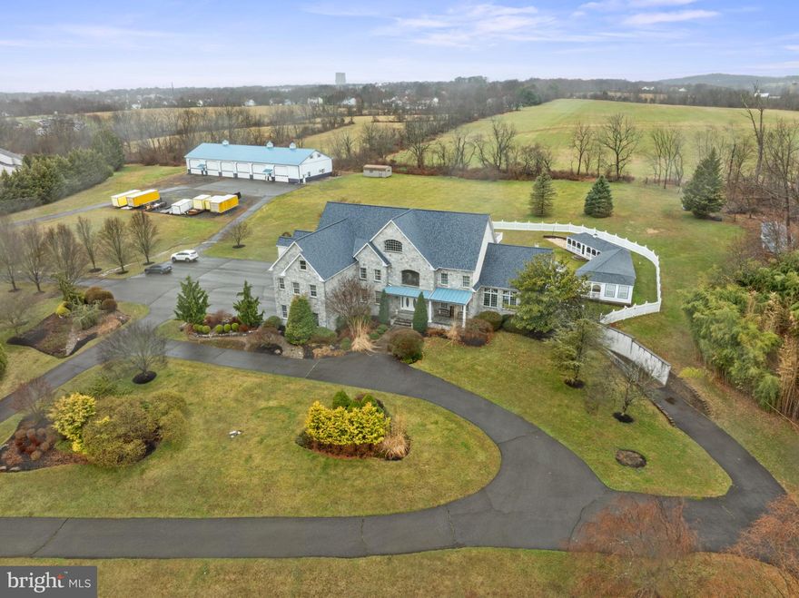 * COMING SOON *
Offered for the first time, this extraordinary 22-acre Estate presents a rare opportunity to create a multi-family property designed for generations to gather, grow and thrive! The history of this property is rich; owned by a prominent, local entrepreneur, this home was built as their "dream home" and no detail was overlooked! 

This nearly 10,000 square foot residence was built with family in mind. Their love for their children, grandchildren and great-grandchildren, as well as the neighborhood kids were at the center of this home. This expansive estate offers a rare blend of luxury living and unmatched versatility, it was built to entertain everyone throughout every season! 

The main home features five spacious & opulent bedrooms, six full bathrooms, and two half baths. Thoughtfully designed for both everyday comfort and grand-scale entertaining. The primary suite features a generous bedroom, large primary bath with soaking tub, private sitting room with fireplace, and ensuite laundry as well as his and hers custom closets! This home has 2 dedicated office or conference spaces perfect for work from home comfort and creating the perfect environment for running your business. Another family-friendly feature is the incredible lower level of the home, fully finished, with a separate double door entrance and driveway for catering deliveries; equipped with a full kitchen, living and dining room, a full theatre showing the latest movies on its drapery lined projector screen, and enough space to entertain everyone for bridal and baby showers, birthdays, and family functions without ever having to use the main area of the home! 

Complementing the main house is an impressive six-bay detached commercial garage with capacity for 15+ vehicles - ideal for collectors, entrepreneurs, or hobbyists alike.  The full commercial kitchen on the interior is outfitted with refrigeration, multiple cooking ranges, and bountiful counter space, is perfect for family reunions and large gatherings. You can capture a vision of tables lining the expansive space filled with food, family and fun!  Visiting for a few days? Just above the garages on the second level, offers a private efficiency apartment as well as a second, two- bedroom apartment with potential for a separate entrance - perfect for multi generational living or guest accommodations. 

The spectacular grounds include an in-ground pool for summer parties and picnics, complete with a screened-in pool-house in case of the occasional rain shower or for keeping the food indoors. It also was a gathering spot for sharing stories and watching the kids enjoying the pool! 

This truly unique estate offers endless possibilities, delivers privacy, scale and flexibility, rarely found in one exceptional home!

This property is a part of Act 319. any rollback taxes for a breach of the Act 319 would be the buyers responsibility. Rollback Tax estimate can be obtained by contacting Jared Jaffee at Montgomery County.