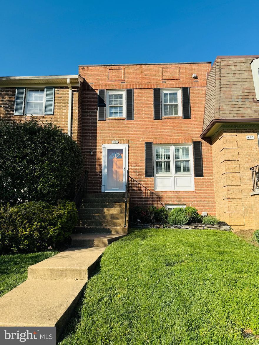 For Rent in the Heart of Vienna! Spacious and light-filled, 3 bed, 4 bath (2 full and 2 half) all brick townhome available immediately. HIGH WALK SCORE! Just steps from the W&OD Trail, the Vienna Community Center and short stroll to Whole Foods,  area restaurants, parks, and more! Freshly painted throughout and featuring updated baths and new carpeting on upper and lower levels, this home offers a perfect blend of comfort and convenience. The main level features hardwood flooring throughout, a living room with built-ins that opens to the dining room, an eat-in kitchen complete with stainless steel appliances, ample cabinet space, and a bay window that brings in tons of natural light. Upstairs, you’ll find three bedrooms, including a primary ensuite, plus a second full bath. Brand new carpeting adds a fresh touch to the upper level. The walk-out lower level offers a versatile rec room with built in shelving, half bath, and a large laundry room with built-in storage, new carperting and french doors that lead to outdoor patio and backyard. One assigned parking spot and numerous visitor spots in front. Trash, front lawn care and snow shoveling are included. James Madison High School Pyramid (Vienna Elementary, Thoreau Middle School).  Minutes to Vienna Metro, Tysons, Mosaic Center, and  66.