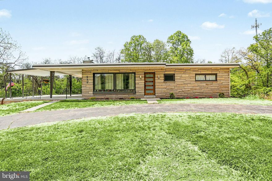 Welcome to this Newly Remodeled (2026) Home, which gives off a Mid-Century Modern Feel. This thoughtfully designed space features 3 Bedrooms , 2 1/2 Baths and Beautiful LVP floors throughout. The large Kitchen is equipped with Warm, Rich Cabinets, Butcherblock Countertops, SS Appliances and ample space for Dining with your Family. The Living room with Stone Fireplace opens up to the Kitchen with a Butcherblock Counter and seating in the Kitchen. Main level has 2 bedrooms and a Full Bath. Lower Level has another Bedroom and full Bath, Laundry Room with Utility Tub, and spacious Family room ,perfect for Friends and Family! Right off the Kitchen is a Covered Terrace, so you can enjoy those relaxing summer days. Underneath is a 2 car Garage with extra storage. This Property sits on 1.75 acres with a small gentle Stream in the back, room for kids to play and a Shed for all your outdoor tools. Come  experience this Delightful Home, all designed for your personal enjoyment! Make this home yours!