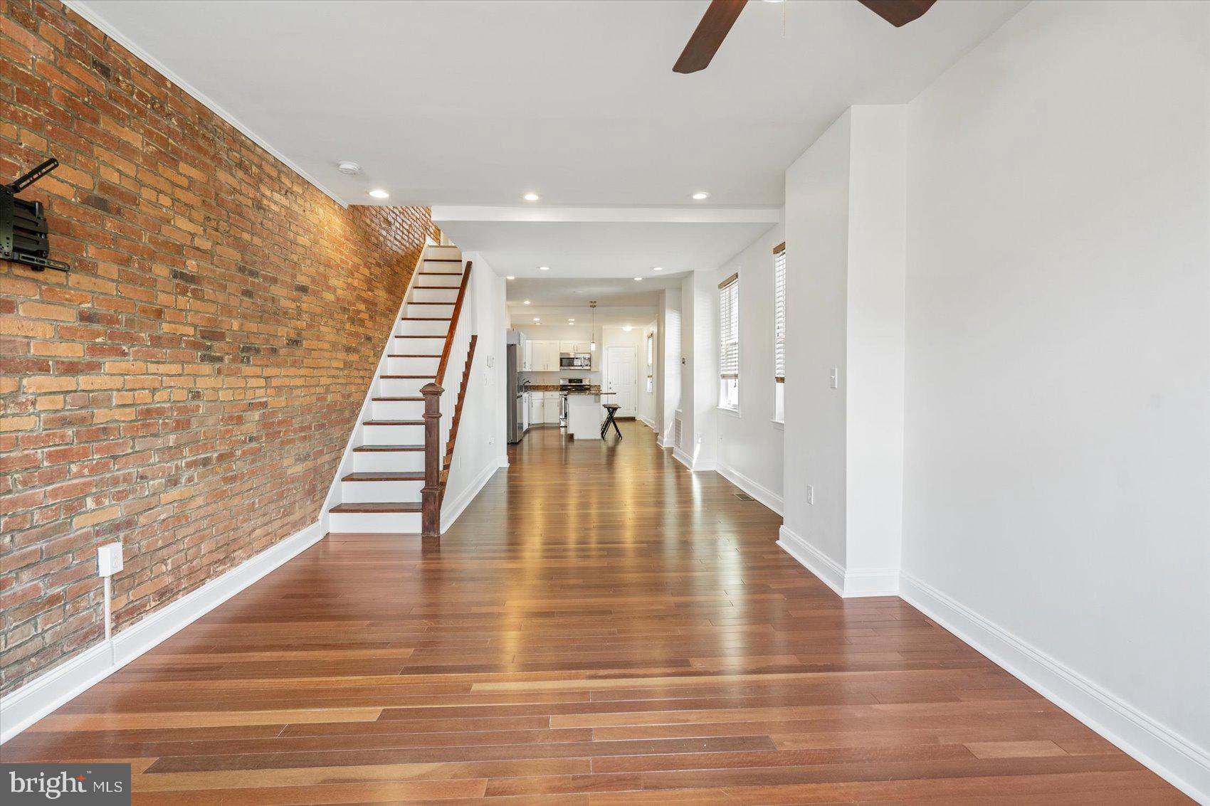 Welcome to your next home in the heart of Brewers Hill—where classic Baltimore charm meets modern comfort. This beautifully maintained 2-bedroom, 2-bathroom rowhome offers exposed brick walls, gleaming hardwood floors, and abundant natural light throughout.
The main level boasts a stylish kitchen featuring stainless steel appliances, a kitchen island perfect for your morning coffee or evening wine, and an open layout that’s ideal for entertaining. Upstairs, the spacious primary suite includes a luxurious soaking tub, a separate shower, and thoughtful finishes that make it a true retreat.
The lower level provides flexible space—perfect for a third bedroom, home office, or cozy family room. As an end-of-group home, enjoy additional privacy and extra light. And don't forget the coveted parking pad in the rear—a rare find in this desirable neighborhood.
From top to bottom, this home is a perfect blend of Charm City character and everyday convenience. Don’t miss your chance to call it home!
** PLEASE CONTACT CO-AGENT WITH ANY QUESTIONS **