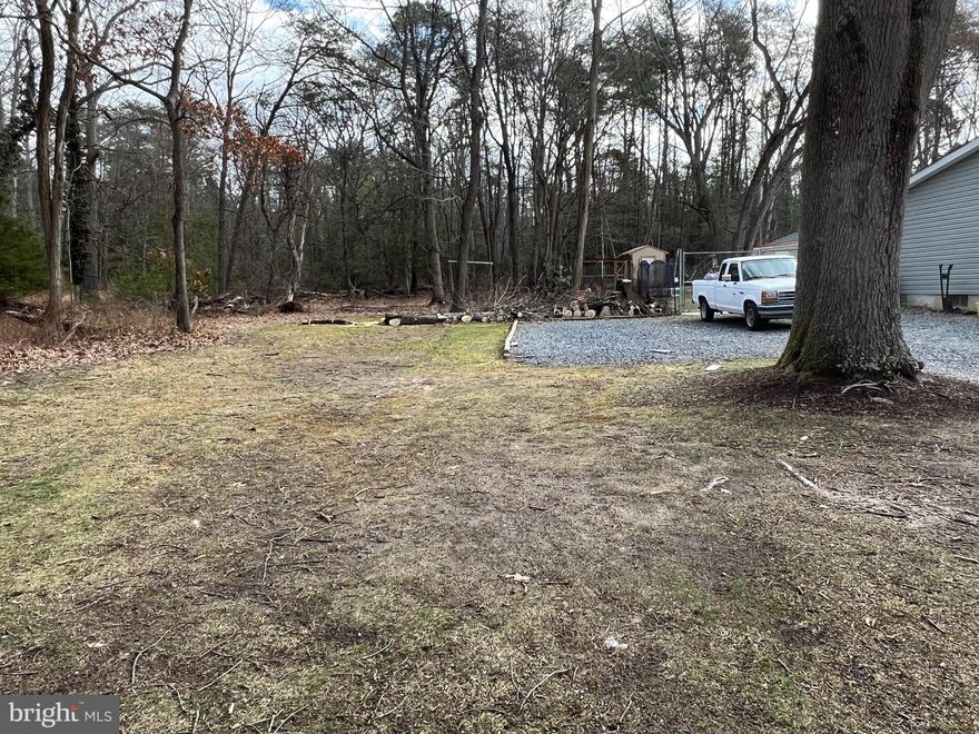 Beautiful .23 acre lot that is cleared and ready to build  in Beachwood Forest, steps away from path to Magothy River. This lot was perced this year and has an approved perc in place. Across the street is Beachwood Park - a waterfront County Park. Anne Arundel County also owns the property behind this lot and to the left of the lot adding to the serenity and privacy of this lot. Perc was done on April 30, 2025