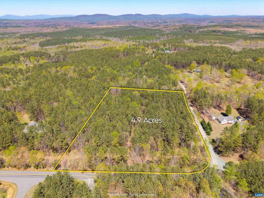 BUILD YOUR DREAM HOME ON 4.9 ACRE LOT IN ALBEMARLE COUNTY!�Discover the perfect canvas for your custom home on this serene 4.91-acre corner lot in the desirable Saddlewood Farms community. Nestled in the rolling countryside of Albemarle County, this buildable parcel offers a peaceful, rural setting just 10 minutes from downtown Charlottesville.?  With no HOA restrictions, you have the freedom to design a home that suits your lifestyle, whether you're envisioning a private retreat or a family estate. The property's gentle terrain and wooded backdrop provide both privacy and natural beauty.?  Enjoy the tranquility of country living while maintaining convenient access to city amenities, including shopping, dining, and entertainment. This is a rare opportunity to create your ideal living space in a prime location.?
