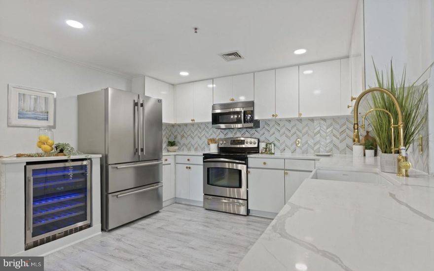 Newly Renovated!!! Immerse yourself in luxury city living in Harbor East at 250 President St., Suite 600. Ask agent about  1 garage parking space option with separate private storage room. This three bedroom two bathroom condo is very spacious with tons of natural light. The entire kitchen has recently been updated and with new flooring throughout. The balcony sits in such a perfect location with an unobstructed view of the inner harbor and Federal Hill. Scarlett Place is within walking distance of The Inner Harbor, Harbor East and Little Italy - a very ideal location. The building offers a wide range of amenities, including a recently remodeled and upgraded fitness center and an indoor pool. Sellers reduced price to give one year of condo fee credits.