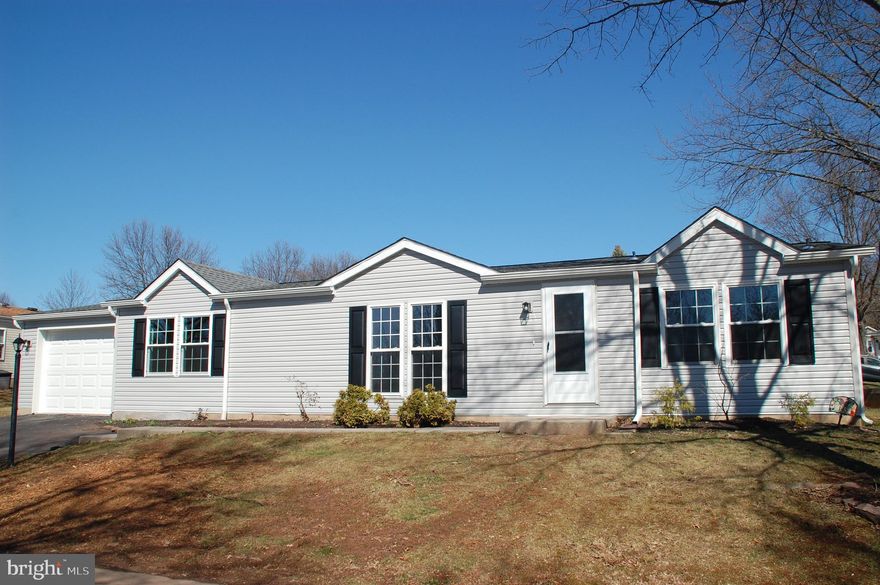 You've been waiting for it - and here it is!  A beautiful home in Hidden Springs with a finished and painted oversized garage (23' x 13')!  A few details to get out of the way.  This home experienced a fire last year caused by a vehicle.  Fortunately no one was injured.   The current assessment and real estate taxes are based on the fire-damaged structure.  The assessment and taxes of the same model with a garage around the corner are $46,400 and $1,974.  Use this information as an ESTIMATE only!  There will be an interim tax bill (ask your agent).  Now for the fun details.  On the outside you will find new vinyl siding and a brand new roof.  Obviously the entire interior has fresh paint and new floor coverings including luxury vinyl planks and carpeting.  And then there's the Kitchen!  Gorgeous new cabinetry with soft-close features and pull-out shelves.  Coordinating granite countertops including a 7' Breakfast Bar! Stainless steel appliances include Frigidaire Gallery smooth-top range, Whirlpool refrigerator, and Haier dishwasher.  Steps away you'll find a Pantry closet.  The Primary BR has a 6' x 5' walk-in closet and the Primary bath offers vanity, 5' stall shower, and linen closet.  On the other side of the house is what could be described as a second Primary BR with a 12' x 4' walk-in closet and full Bath with tub/shower unit, vanity, and lots of cabinet storage.  The Laundry Room includes a utility sink and direct access to the garage.  Whirlpool HE Clean washer with Affresh and HE dryer included.  Kitchen and Laundry appliances are not new.  Above all ceilings new fiber glass batt insulation has been installed and also for the most part in the walls and under the floors in Primary BR, Primary Bath, and Laundry Room.  The rear concrete Patio measures 18' x 8' and Shed 8' x 8'.  There's a lot to see here.  Come check it out.  You won't be disappointed.
