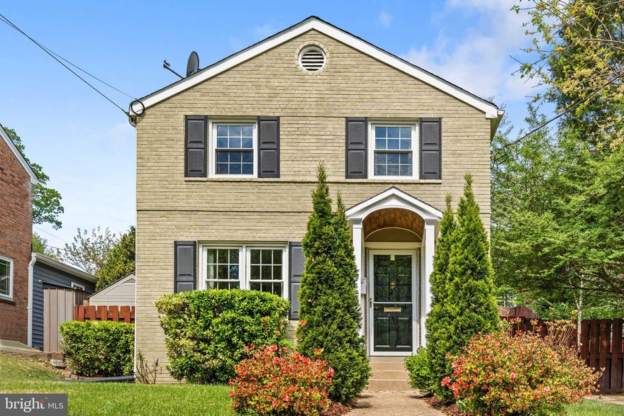 Welcome to this charming brick Colonial in the Columbia Forest neighborhood of Arlington, offering flexible living space across three levels, including a finished lower level with a room currently used as a third bedroom. From the moment you enter the home, you are greeted by an abundance of natural light from ample windows and beautiful hardwood flooring that creates a warm and inviting atmosphere throughout the main level.

The freshly painted interior (2025) offers a functional and comfortable layout, featuring a spacious living room that flows seamlessly into the formal dining area and kitchen. The kitchen includes several recent updates, including a new over-the-range microwave (2026), garbage disposal (2024), a new kitchen faucet and soap dispenser (2026), and a recently replaced air conditioning system (2022). From the kitchen, step directly out to the fully fenced backyard, creating an effortless transition for indoor-outdoor living.

The backyard offers a wonderful setting for relaxing or entertaining, featuring a patio area perfect for grilling or unwinding on a pleasant evening. For gardening and nature enthusiasts, the multi-tiered garden provides a beautiful and unique outdoor space to enjoy just in time for the summer months.

Heading upstairs, you will find two well-sized bedrooms and an updated full bathroom. The spacious primary bedroom features a walk-in closet and offers plenty of room to create a comfortable retreat. Both bedrooms include real hardwood flooring beneath the existing carpet, providing the opportunity to easily showcase the original floors.

The spacious finished basement adds additional versatility and includes a large room currently used as a third bedroom, along with a full bathroom. This flexible space can easily function as a guest suite, home office, recreation area, or additional living space depending on your needs.

Situated near Route 7 and Columbia Pike, the home enjoys a highly convenient location with easy access to Four Mile Run Drive, nearby trails, and the W&OD Trail for outdoor recreation. The property is also conveniently located near the highly sought-after Campbell Elementary School and Claremont Spanish Immersion School. Dining, shopping, and entertainment options in the Village of Shirlington are also nearby, and the home offers an easy commute to Reagan National Airport and downtown Washington, DC.

Offering a perfect blend of everyday convenience, outdoor recreation, and classic Arlington charm, this home is one you will not want to miss.