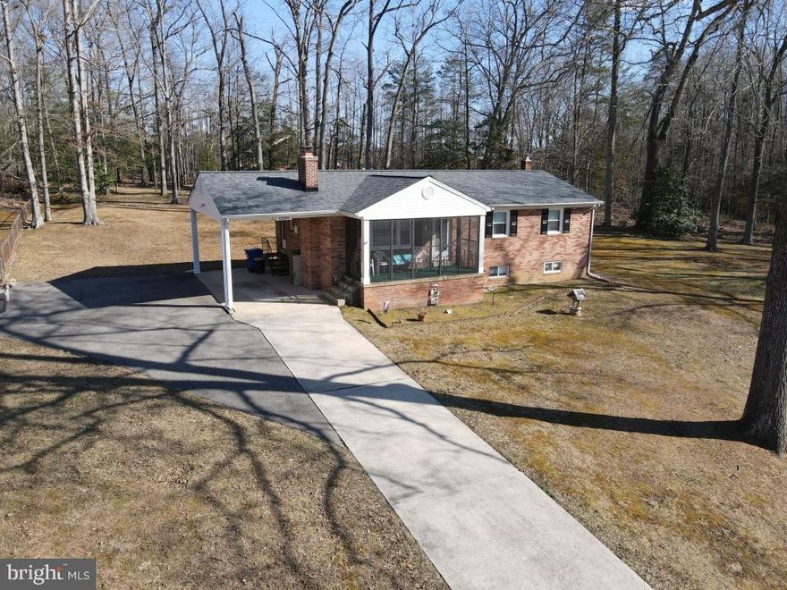 All brick rambler with full, partially finished basement located on dead end road. Carport with extra driveway  parking. Original owner!  Roof replaced in 2023  and gutter guards added in 2023.  New windows installed in 2018.  New hot water heater 2025.  Well maintained and recently painted. Cedar closet in basement  Possible 4th bedroom in basement. The home is located  on a treed lot with a private back yard. The  living room rug, front porch furniture and two cabinets in workshop area conveys.