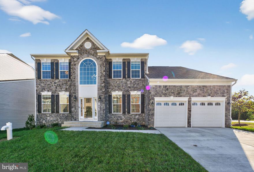 PRICED REDUCED! MOTIVATED SELLER relocating for work. Assumable mortgage at 4.875% Interest rate for qualified buyers! Welcome to this stunning home that completed construction early this year in January 2025. This home offers over 4,000 sq ft of living space in the flourishing Signature Club community. This home is one of the largest models in the neighborhood and offers all the benefits of new construction, without the wait. This is a rare opportunity for you to move into a modern, move-in ready home at an unbeatable value. This home is perfectly situated on a corner lot with amazing curb appeal. 

Step inside to discover a bright, open-concept floor plan that blends style, functionality, and modern luxury. The main level boasts luxury vinyl plank flooring throughout and a gourmet kitchen designed to impress. Enjoy an extended island, double oven, Energy Star stainless steel appliances, farm sink, abundant cabinetry, and a walk-in pantry - everything a homeowner could dream of. The adjacent sunroom fills the home with natural light, creating the perfect spot for morning coffee or relaxed dining. The spacious living room centers around a custom-built media wall complete with an 85 inch TV and electric fireplace, making it ideal for entertaining or cozy nights in. A modern half bath and brand new front-load washer and dryer complete the main level. 

Upstairs, you'll find four generous sized bedrooms, including a luxurious owner's suite that's truly a retreat. The primary suite features a sitting area, large walk-in closet, and a spa-inspired bathroom with a stand-alone soaking tub, walk-through shower with dual shower heads, his and her vanities, and a private water closet. The additional bedrooms offer ample closet space, custom accent walls, and easy access to a beautifully appointed full hall bathroom. 

The lower level offers over 900 sq ft of finished space perfect for entertaining. There is also more than 550 sq ft of unfinished space with a rough-in for a future bathroom and a large room that can be used as a 5th bedroom, gym, theatre, or game room. The possibilities are endless! 

This home combines modern elegance, energy efficiency, and thoughtful design in one package. Only moments away from shopping with easy access to route 228, route 210, and 15 mins from Washington, DC.  

Why wait when you can move into this barely lived-in dream home right now?!