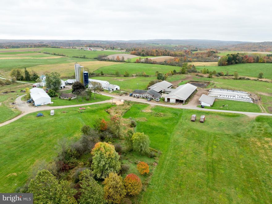 163-acre working dairy farm with double 12 Delaval milking parlor setup and two residential houses. The current setup was completed in 2002, and the tie stall barn was converted to free stalls for heifers. There is an ample amount of feed storage on site and approx. 1,750 tons of feed are included with options for hay and also leasing 250 +/- additional acres. There are 4 bunks and 4 silos (20x60 Harvestore, 20x76 and 20x80 poured concrete, 14x45 stave silo) The cows just left, so this is move in ready with an option to buy 112 heifers (24 currently bred) from calves to 14 months old. Farmland is preserved and coal rights are included. The land is level to sloping and has dual road frontage. Here is an opportunity to purchase a turnkey, family friendly farm located in dairy oriented and scenic Somerset County!

More info:
•            163 acres in farm preservation
•            3 beds, 2 bath Farmhouse (2,147 SQ FT)
•            3 beds, 1 bath Ranch House (1,014 SQ FT)
•            Double 12 milking parlor (built in 2002)
•            Delaval 4000-gal bulk tank & milkers
•            32 x 42 milkhouse and shop area
•            40 x 46 Crowd gate area & 40 x 48 parlor
•            16 x 40 office, bathroom, w/ heated floor
•            62 x 200 Freestall barn (built in 1999)
•            62 x 108 Freestall barn (176 stalls total)
•            20 x 36 breezeway w/ cattle chute
•            34 x 80 calf barn (built in 2009)
 

•            40 x 134 Pole barn for equipment/hay
•            50 x 68 bank barn w/ 28 x 46 addition
•            20 x 36 older calf barn
•            72 x 114 barn with bunk feeder & 3 silos
•            55 x 95 free stall barn (converted tie stall)
•            22 x 36 two car garage w/ door openers
•            1000 Tons of Silage & 750 Tons of Haylage
•            4 Bunks, 132’ drive thru, two 40’ & two 35’
•            2 - 200-amp electric service and 4 wells
•            1-million-gallon earthen manure storage
•            120 Tillable acres, 60 Acres in pasture
•            Additional rented land available