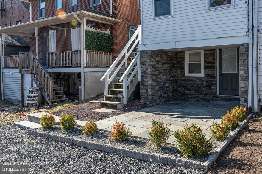 Showings to begin Sunday May 18th! Absolutely stunning apartment in Doylestown Boro.  Pull into your parking spot and walk right in, or sit out on the brand new hardscaped patio.  A complete renovation has you stepping into perfection, floors to ceiling redone.   As you enter, you see a stunning kitchen with new cabinets, brand new stainless steel appliances and quartz countertops.  Accented with a classic backsplash and state of the art new fixtures completes this space.  Right off of the kitchen you will find a luxury bathroom that will make you think you're at a 5 start hotel.   The bathroom has stunning tile, an accent wall and black accent features.  A brand new washer and dryer is also in unit.   From there, a spacious living area with extra recessed lighting and a sliding barn door to the bedroom.  The bedroom is a nice size and off of the bedroom is a nook area that could be used as a closet, a small reading nook or for storage.  With new flooring spanning throughout and everything freshly painted, you can move right in and start enjoying boro living.  It is also highly efficient with a mini split system for heating and cooling.  The house has a whole house water filter and softener.  As mentioned, one parking spot is included as well as water, sewer and trash.  Tenant pays for electric, Internet and cable. No vaping or smoking of any kind permitted on the property