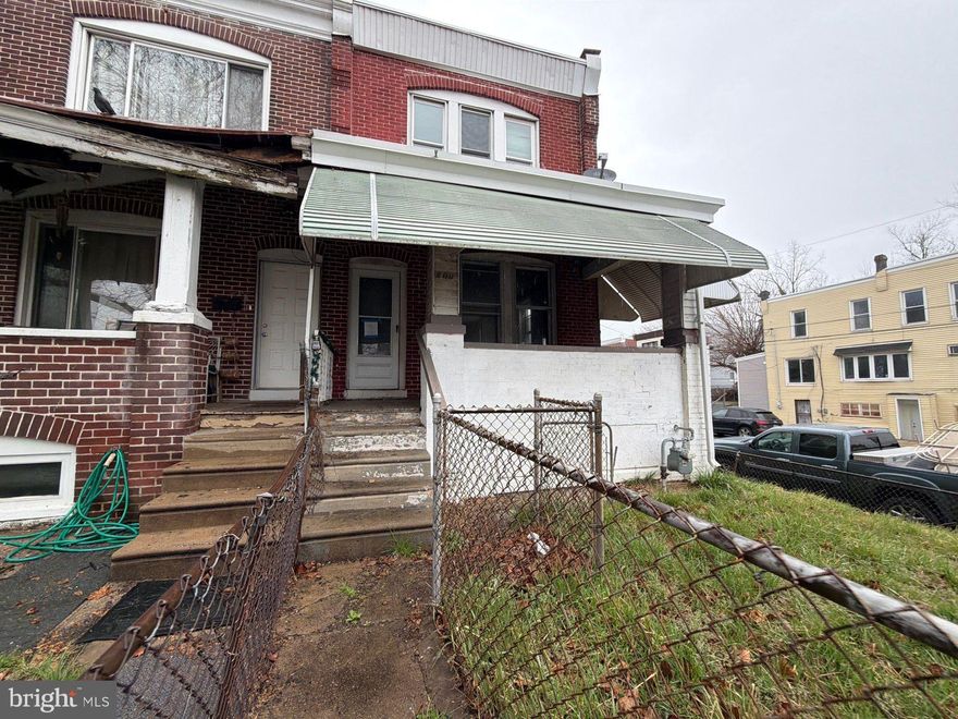 Situated on a corner lot in the City of Chester, 800 W. 11th St. is an end-unit rowhome offering added outdoor space with fenced front, side, and rear yards. The main level features a traditional layout with a living room, dining room, and an eat-in kitchen with direct access to the rear yard—ideal for everyday convenience. Upstairs, you’ll find three bedrooms and a full hall bathroom, while the unfinished basement provides excellent storage potential. Located just minutes from I-95, Route 291, and the Commodore Barry Bridge, this home offers easy access to Philadelphia, Delaware, and the surrounding suburbs. Nearby amenities include Subaru Park, Harrah’s Casino, local schools, and neighborhood shopping, making this a practical option for homeowners or investors seeking value in a well-connected location.