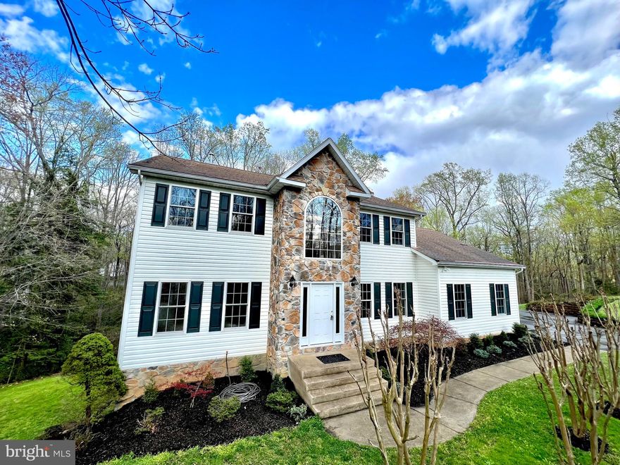 Come to one of our open houses and make your offer! Open Saturday 4/20  1-3pm and Sunday 4/21 1-3pm.  This is the one you have been waiting for!  Absolutely beautiful home situated on a private  oasis of 3.4 acres, minutes from the Brooke VRE station.  Home features 5 bedrooms,  2.5 baths, a formal dining room, gourmet kitchen with new appliances, and a large open family room with lots of natural light and a gas fireplace.  Large primary bedroom has an ensuite, including a Jacuzzi tub.  The first floor bedroom could also serve as an office or library.  The home and garage are freshly painted, and the driveway was just sealed.  The possibilities are endless for the future owners to finish off the HUGE unfinished basement that has rough in plumbing for a future bathroom.  The deck overlooks a large fenced in private yard, with a tree buffer between you and the neighbors.   
  
Best of all, this home is a commuter's dream- less than 5 miles to the Brooke Virginia Railway Express (VRE)  station.  Also, close to Quantico Base and short drive to commuter lots.  

Check out the virtual tour!
Schedule your showing or stop by one of the open houses before this one is sold!
*Virtual Staging included in the photos