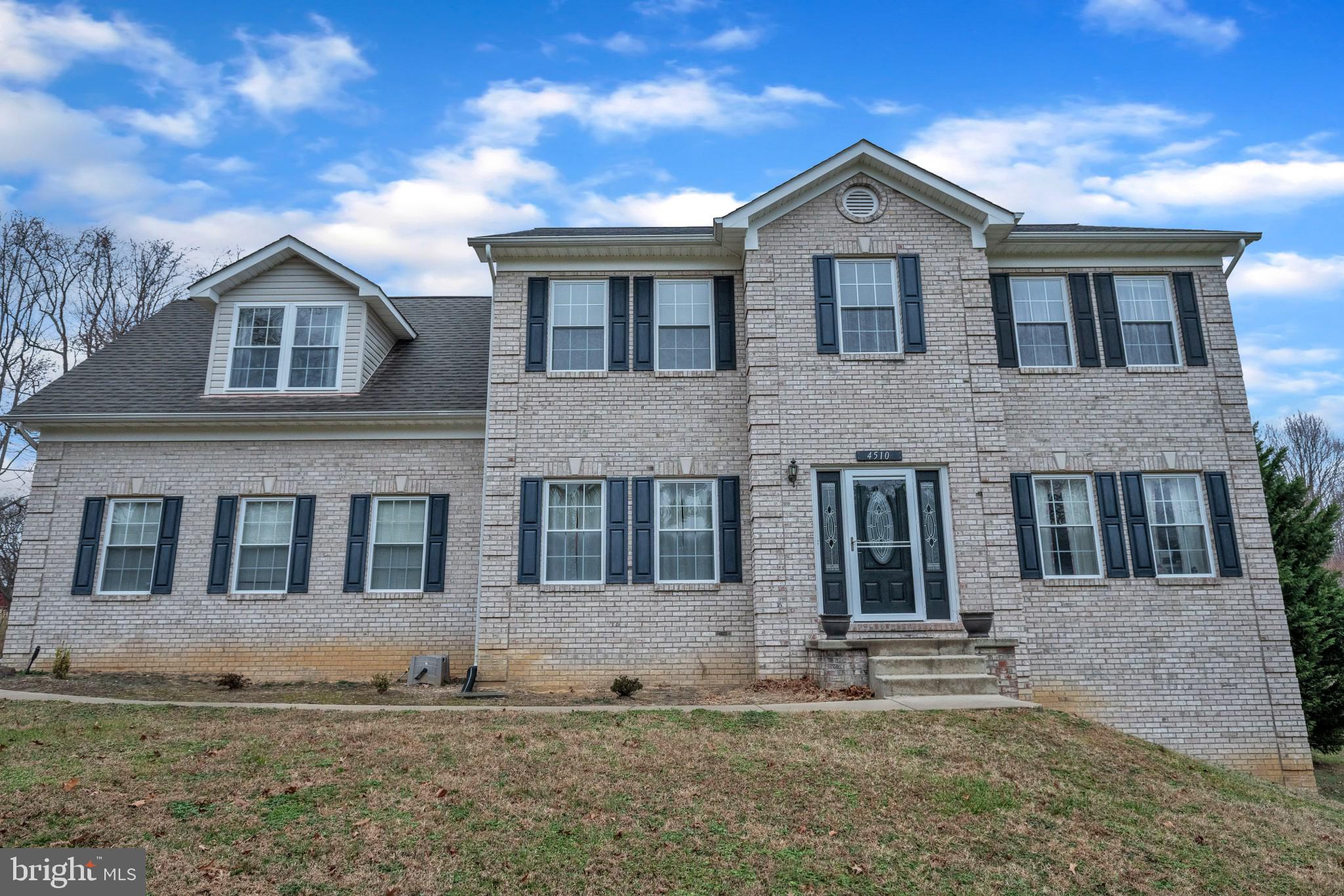 Located in highly sought after Huntingtown area. This lovely brick front home sits on 3 acres and backs up to the woods. This home was built in 2000 and features 4 bedrooms with a bonus room above the garage. A partially finished basement with room for entertaining. In the summer months enjoy sitting on the large deck over looking the above ground pool, watching and listening to nature. Main level features an open concept area in the back of the home, formal dinning room and formal living room.