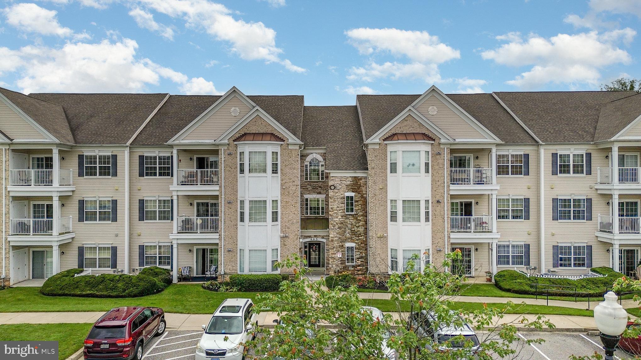 Welcome to Irwins Choice—one of Bel Air's most sought-after condo communities! This beautifully maintained 2-bedroom, 2-bath condo offers the perfect blend of comfort and convenience. Step into a welcoming foyer that opens to an airy, open-concept living space with sightlines to the dining room, living room, and kitchen.
Enjoy hardwood floors throughout the main living areas with carpet in the bedrooms, and a bright, functional kitchen featuring ample counter space, a breakfast bar with pendant lighting, all appliances included with a newer microwave. A versatile den/flex room just off the kitchen offers endless possibilities—ideal for a home office, hobby room, or guest space.
The bedrooms are thoughtfully placed on opposite ends for added privacy, each with its own full bath. The primary suite includes an updated elevated toilet for comfort and convenience. Step out to your covered patio from the living room—electronic blinds on the sliding door make light control a breeze—and soak in beautiful views of the surrounding greenery.
Additional highlights include built-ins in the dining area for extra storage, a new HVAC fan (2024), and proximity to local dining, shopping, and major commuter routes.
Don’t miss this opportunity to own a stylish, low-maintenance home in the heart of Bel Air!