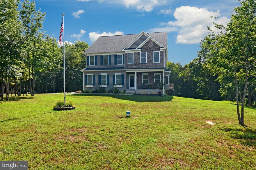 WELCOME HOME to 5334 Piney Green Drive where style and great taste meet design and functionality.  Every detail of this beautiful home and 11+ acre property has been thought out and deliberate.  All of the planning and personal touches come together and the final result is perfection. Your guests will be greeted on a charming front porch, which is also the perfect spot to watch deer and other wildlife go by.  Step inside to see the gorgeous Cali Bamboo flooring that runs through most of the first floor.  Working from home these days? The main level has an ample home office with bright windows and space to fit two desks easily.  KGI Internet is available and the house has been wired for service.  Host holiday dinners and entertain friends under the romantic glow of the Edison bulbs in the geometric dining room light fixture. The open layout of the family room makes for the perfect spot for family and friends to gather by the fireplace ... AND the KITCHEN....   Wow!  Stunning Quartz countertops, white cabinetry with soft close drawers - both for storage and to show off your collections, Wine storage, custom made open shelving, and custom made one of a kind lighting.. it's all here.  The attractive, upgraded stainless steel appliances will help make meal prep and baking a breeze.  The dual fuel stove has gas burners and an electric oven that also functions as a convection oven, a warming drawer is down below that. The over-sized island looks like a beautiful piece of furniture. It houses a microwave that can be used as a convection oven as well.  The mudroom provides the perfect spot to keep your shoes, bags, keys and other everyday items handy - but out of the way.Upstairs you'll find a wide hallway and 4 large bedrooms. Each bedroom has a great closet for storage. You'll be spoiled in the huge master bedroom with his and hers organized walk in closets.  You'll love the look of the charming Pallet wall. The private en suite bathroom has attractive slate tile flooring, a beautiful vanity, and larger shower with glass doors. Stay fit and work out in the home gym on the lower level.  Need multi-generational housing?  A full  beautifully finished apartment is also on the basement level.  Your in-laws or young adult children could have a place of their own, while still being close and independent. The apartment features a full kitchen, living room, bedroom, full bathroom, and laundry area. This home has it all!There is still more... Outside you can enjoy your morning coffee on the back deck,  gather with friends on the patio or around the fire-pit. Got toys? There is an attached 2 car garage and also a detached 3 car garage with 200 amp service to house all of your vehicles, tools, boats, etc. Since the property is located in an equestrian community, it could also be easily converted into a stable for horses.The community has access to the Chotank Creek, which leads out to the Potomac River.  Its the perfect place to kayak! With all of the features that this home and property offer, it will not last on the market very long.  Schedule a private tour today to see all of this and so much more.