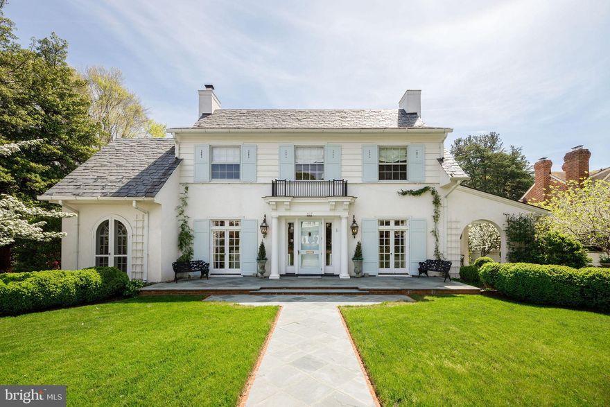 Showings begin Thurs, 4/16. Built in 1922, 307 Oak Lane is a rare architectural treasure designed by Carl Lindner, Sr. and is the second home constructed in Hampton Gardens. Rich in history and character, this distinguished residence blends timeless craftsmanship with thoughtful modern updates. Featured on the 2021 Historic Garden Week Tour, other notable moments in the home’s past include violinist Isaac Stern performing in the living room as a guest of a former Richmond Symphony Foundation chair, and a crape myrtle in the rear garden gifted to previous owners by The White House during the Truman era. ***This beautiful home offers four bedrooms, three full baths, one half bath and features 10-foot ceilings, transomed doors, two indoor fireplaces, and a Buckingham slate roof in a rare irregular pattern favored by Lindner. Elegant details include a geometric diamond design in the front hall floor and Italian stucco walls in the sunroom, both by decorative painter Anne Thompson. A significant 2013 renovation by architect Charles Aquino and builder Chip Spitzer expanded the home to include a new primary suite, a second-floor laundry room, and a new open-concept kitchen and family room addition at the rear of the home, seamlessly integrating modern comforts while preserving the home’s historic integrity. ***The property's professionally designed grounds and outdoor living spaces are a stunning backdrop for hosting family and friends. French doors from all main-level rooms open to terraces, including the family room’s access to the covered bluestone porch, creating seamless indoor-outdoor flow. Built in 2018 by Gardner Construction, the porch features a wood burning fireplace, television, fans, and sound system - perfect for year-round entertainment. Additional features include a courtyard with water feature (masonry by David Aldrige and Craddock Masonry), fenced kitchen and herb garden, original entrance columns repurposed as garden focal points, custom copper outdoor lanterns by Carolina Lanterns, a 19’ x 14’ shed with French doors, a Richmond granite cobblestone-edged driveway that can accommodate three cars, and a bluestone walkway bordered by original brick. This is a truly special offering - where architectural pedigree, historic provenance, and modern livability come together in one extraordinary home.