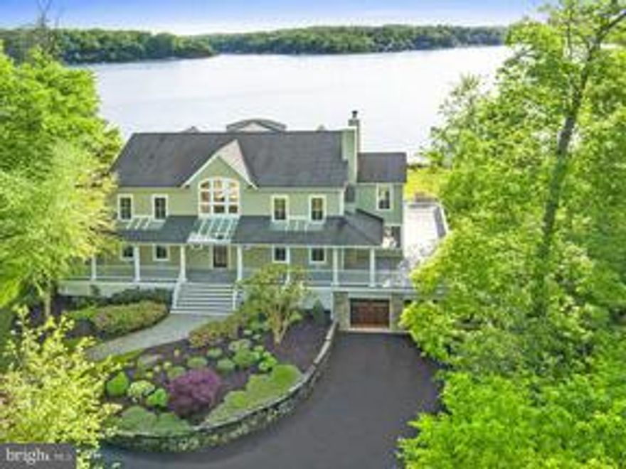 Great new price on exceptional waterfront home on private 1.73 acre natural setting w/panoramic Severn River views from 3 of 4 levels. Owners have expanded views, added living shoreline, landscaping, elevator to 3 levels, upper level office & lower level wine room. Enjoy sunset views, fine architectural details, walnut floors, wrap-around decking, hot tub overlooking river & deep water slip w/lift