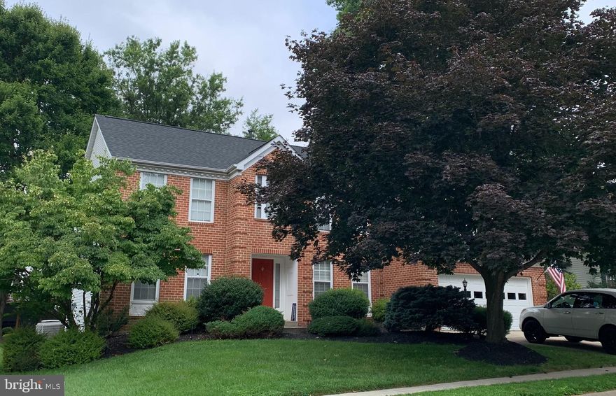 Stately brick front home located in a quiet cul-de-sac.  Nestled on a no through street with mature trees and professionally cared for landscaping. This beautiful property has over 4,500 sq ft of living space, to include three finished levels.  Luxurious two story foyer on the main level that opens to your living room with french doors and formal dining room with butlers pantry.  Two story family room with fireplace is in the back of the home adjacent to the large office and expansive table space kitchen.  Your kitchen boasts cherry cabinets, stone counters, a pantry and pendant lighting.  Convenient entry from the garage into the kitchen and a main level laundry room. A powder bath  and coat closet complete the main floor.  Upstairs the primary suite has a double door entry, cathedral ceiling and is spacious enough to accommodate king sized furniture and a sitting area. Large primary bath with separate bath/shower and double vanity.  Three additional large bedrooms and spacious hall bath on upper level.  The lower level will not disappoint, with a recreation room and a separate den that could be your home theatre or fitness room!  A level rear yard with a deck is perfect for entertaining.  New Roof (2023), New Siding (2023). New Main Lvl A/C unit (2023), AHS Home Warranty!  Fantastic location. Shopping and restaurants in nearby Kentlands & Downtown Crown. This is the one you have been waiting for! Offers due by 5pm Sunday 8/27