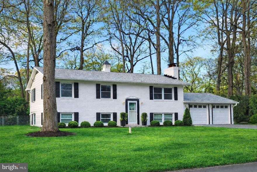 OPEN HOUSE Saturday 3/21 - 12:00 - 2:00
At last, the one you've been waiting for.  A beautiful home in a waterfront community.  Move right in and start enjoying the Annapolis lifestyle.  Anchorage is an amenity filled waterfront community in which the yearly HOA fee includes the use of a boat slip, community pool and more.
This characterful 5 bedroom 2 1/2 bath home has approximately 2,354SF of living space and has been renovated within the last 4 years. Upgrades that include HVAC, tankless hot water heater, well pump, sewer line, roof, downspouts, gutters, soffit and windows make this home a low maintenance joy.  A bespoke new sunroom addition off of the kitchen includes a wood burning stove. Simply delightful!
The sparkling kitchen with a new double oven and stainless appliances has an easy flow with classically beautiful cabinetry and quartz counters. Wood floors continue through the living room and down the hall to 3 bedrooms which include the primary with ensuite bath and an additional half bath.   
Downstairs there are 2 bedrooms, a full bath, laundry room, storage room and family room with a fully lined fireplace and wood stove. Garage access is through this room. In the 2 car garage you'll find 2 EV chargers. The harmonious floor plan guides you from room to room with ease.      
Sitting on nearly 1/2 acre, the outdoor space won't disappoint. Entertaining is a breeze here, enjoy the spacious deck which is adjacent to the sunroom and overlooks the level, lightly treed and fenced backyard.  Landscaping which has matured with the years adds to the natural charm of the property.
Two storage sheds provide plenty of storage with one facing the driveway for easy bike storage access.
The community waterfront on Lake Ogleton includes 49 deep water slips in the marina, community pool, kayak storage, boat ramp and basketball court. The Chesapeake Bay is a quick motor away and historic downtown Annapolis is minutes by car underscoring the desirability of this home's locale. 
Filled with amenities and coupled with location, Anchorage is a community that truly has it all.