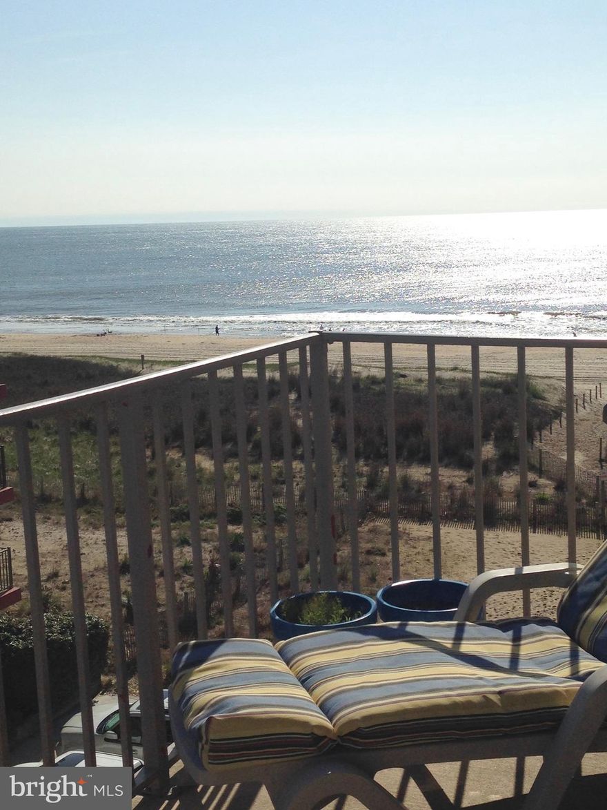 Top corner unit in oceanfront building with stunning views of ocean and bay! 2bed/2bath unit is ready to move in & perfectly decorated with lots of coastal charm. Large oversized balcony with access from both the living rm& master bedroom. Large laundry rm for storage, 2 off street parking spots & elevator. Midtown location & low volume beach! Rental income:$2300/wk peak season. 1 year home warranty